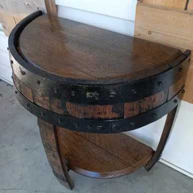 Rustic half barrel end table with metal accents and dark stain