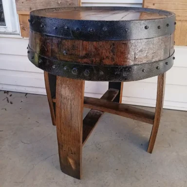 barrel end table with dark stain and black metal rings