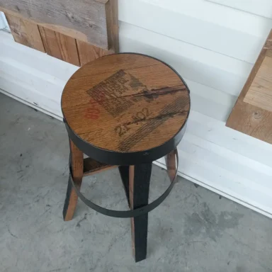 top view of wooden end table showing the distillery stamp