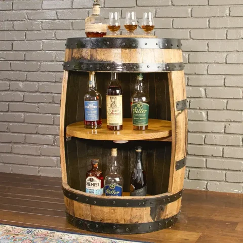 Handcrafted Whiskey barrel cabinet featuring 2 lazy susans. Metal rings painted black.