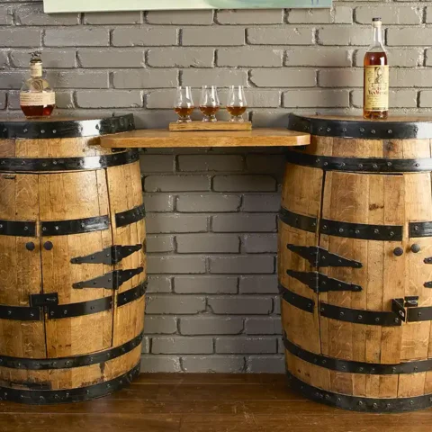 bourbon barrel console table with doors and lights. Metal rings painted black to match the hardware