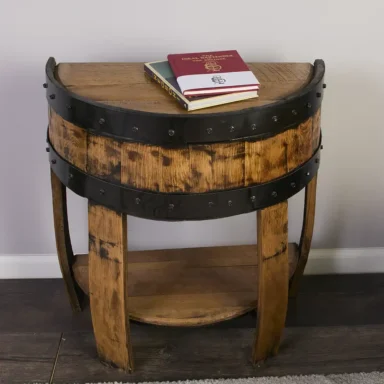 Half bourbon barrel end table with lower shelf. rings painted black to accent the barrel