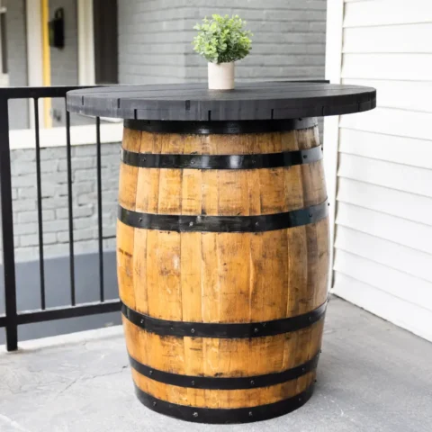 Outdoor barrel table with black tabletop