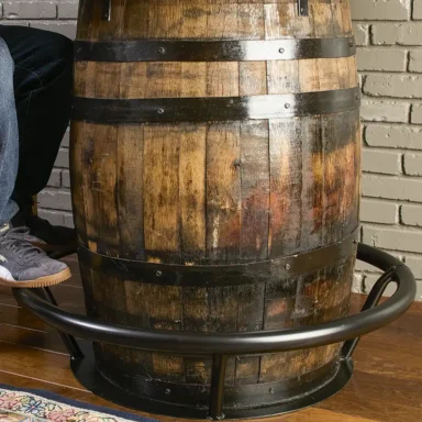 metal footrest around base of barrel table